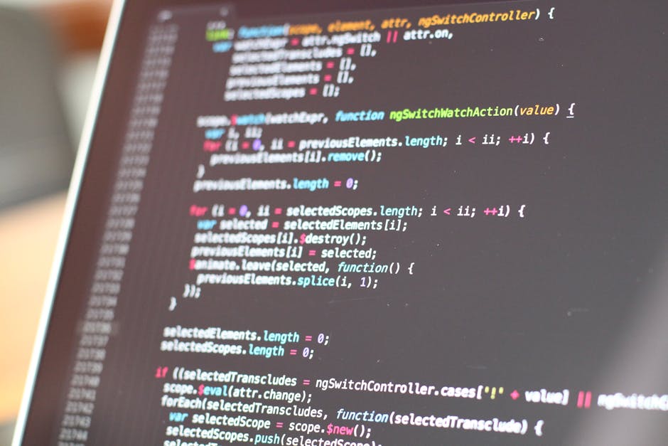 A close-up image of a computer screen displaying HTML code with colorful syntax highlighting in pink, green, and white. The code includes various tags such as <ul>, <li>, <a>, and class attributes use